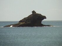 Hawksbill A Natural rock formation in the bay gives the resort it's name of Hawksbill (No look closer.... it's not a Dolphin!!)